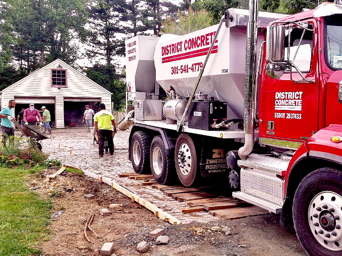 district concrete truck pouring cement