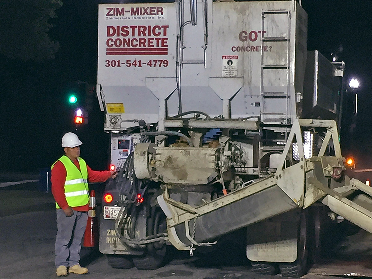 district concrete truck pouring cement